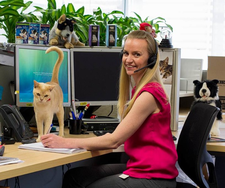 Leanne gets help from her feline friend Claude at Purina.
